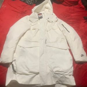 Never warn , Nike tech pack parka , size large standard fit